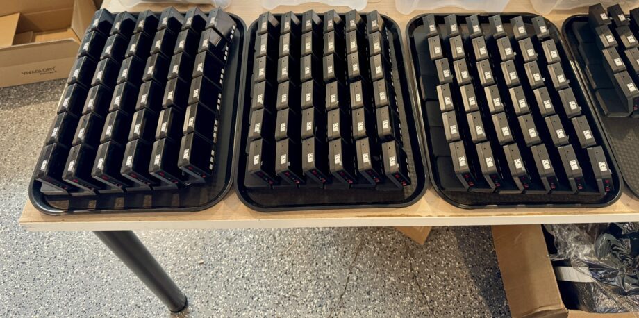 Trays of finished codeMeter desk displays ready for an enterprise order